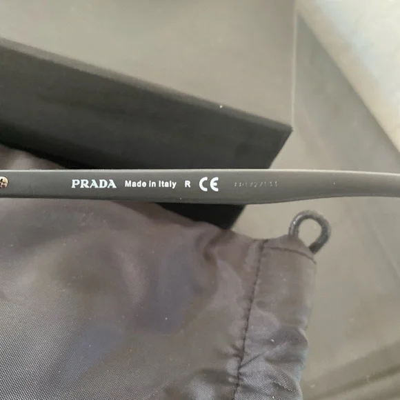 Prada sunglasses with the glasses bag and box